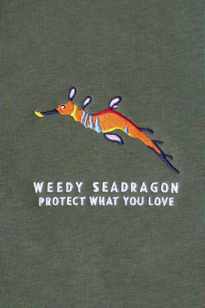 Kelp relax jumper with a weedy seadragon design and the Protect What You Love text 